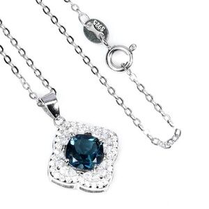 Natural 6mm London Blue Topaz in 925 sterling silver with 18” necklace.